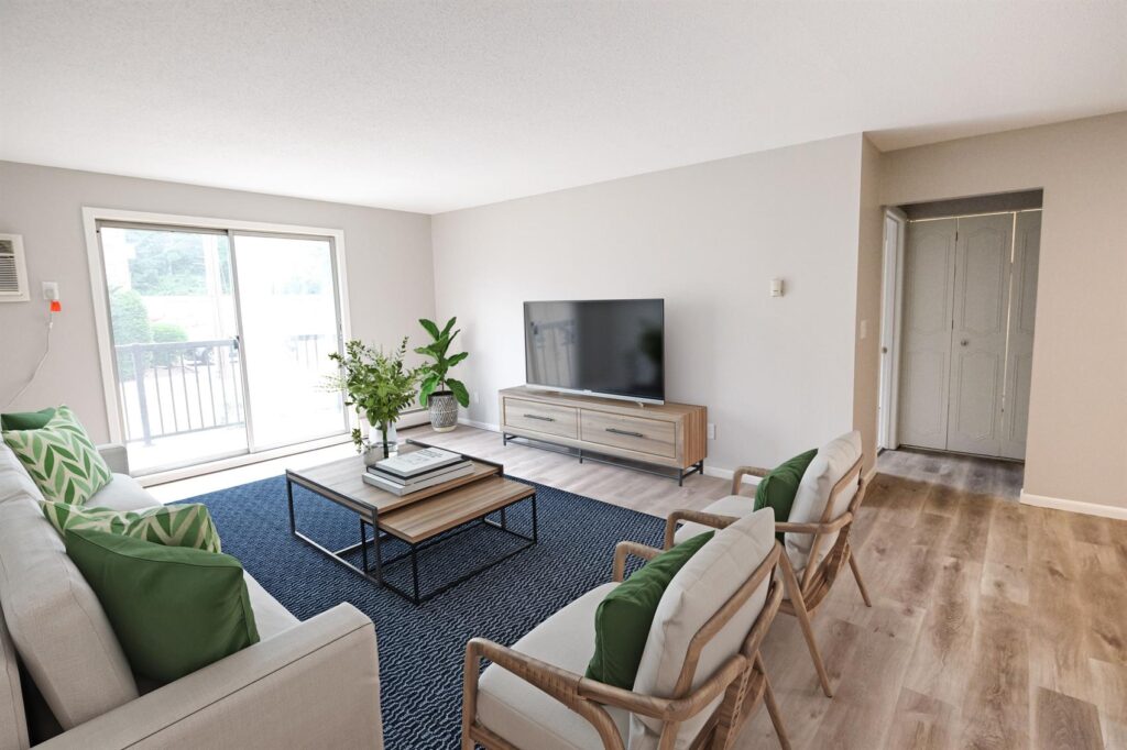 furnished living room with sliding-glass doors out ot the private patio