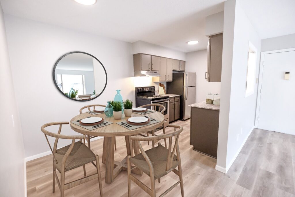 Floorplans at The Concord flow from the living room to the kitchen and inning space.